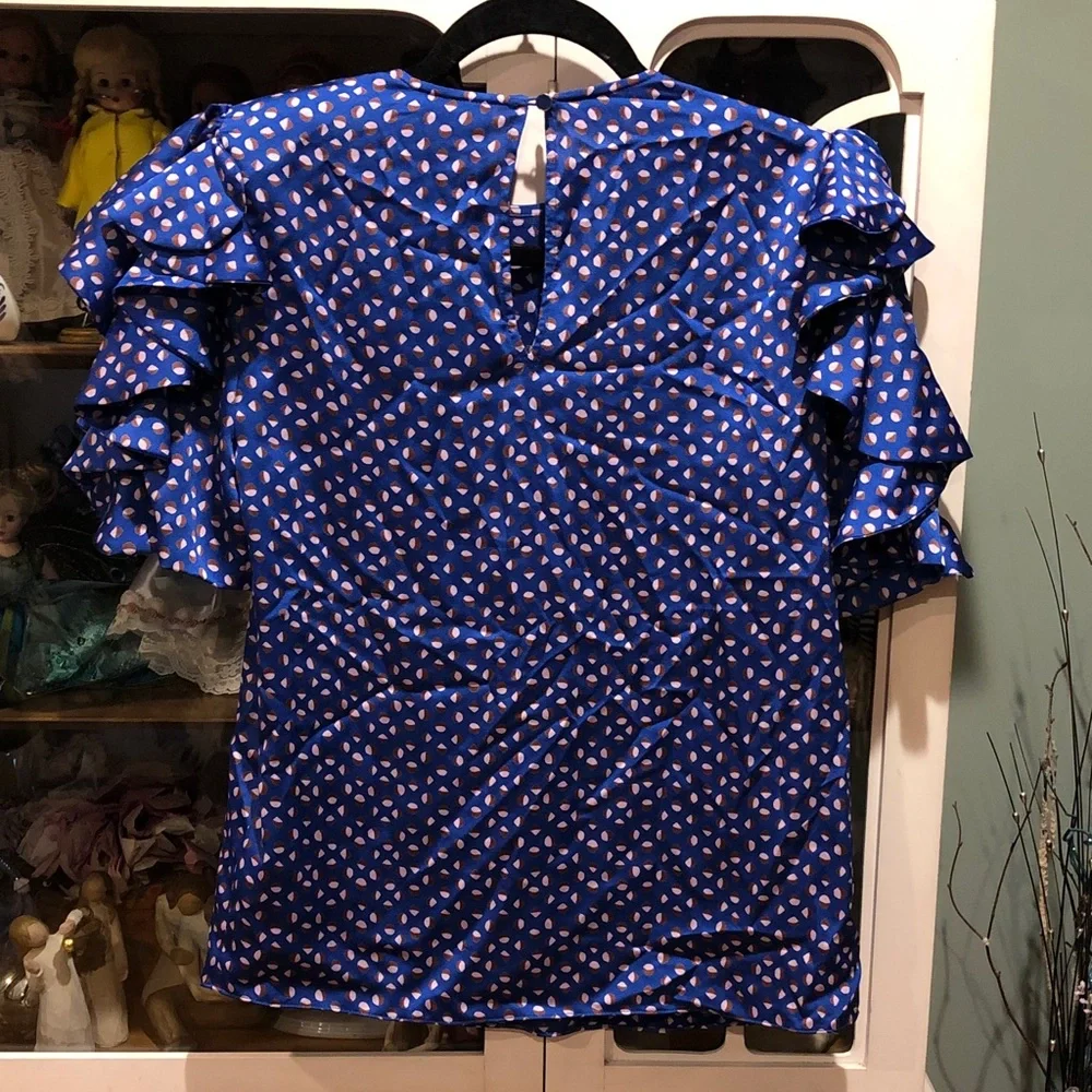 Authentic kate spade NWOT Blue top with design